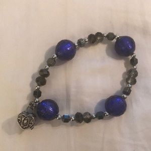Blue stretch bracelet with charm